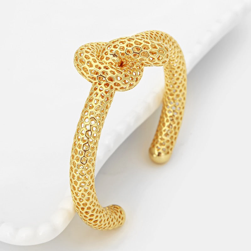 SU Gold Infinity Knot Cuff