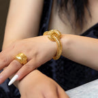 SU Gold Infinity Knot Cuff