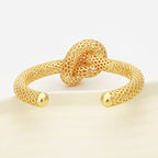 SU Gold Infinity Knot Cuff