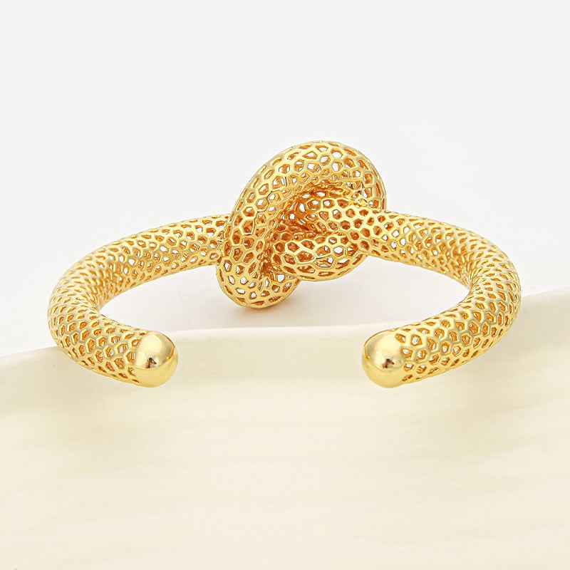 SU Gold Infinity Knot Cuff